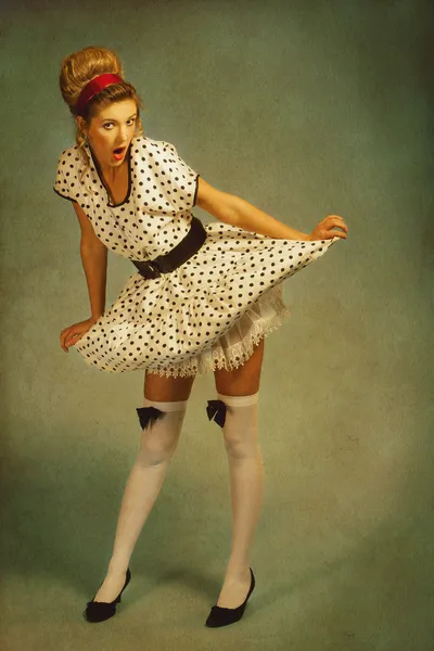 Pin up girl. Retro female portrait with added vintage paper text