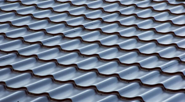 Blue metal tile roof, background