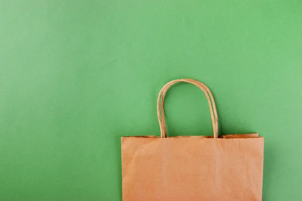 Paper bag on a green background