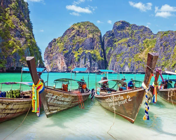 Traditional longtail boats in the famous Maya bay of Phi-phi Leh