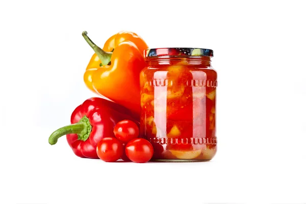 Tomato jam with pepper in glass jar.