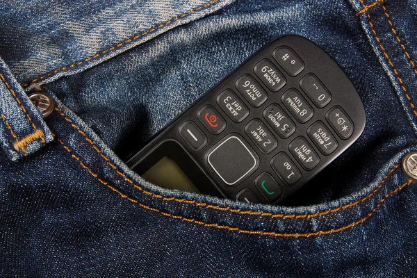 Mobile phone in pocket jeans