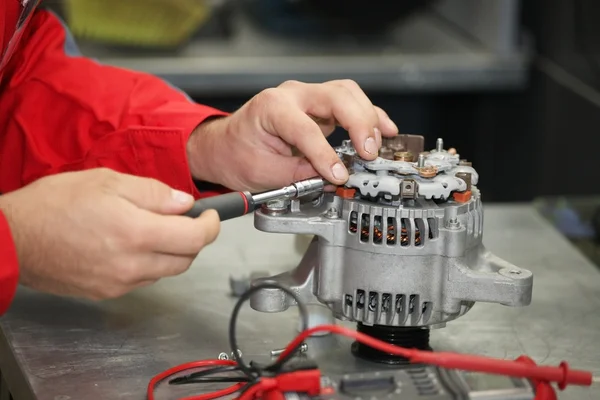 Mechanic restores a generator