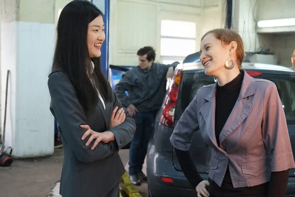 Two girls in car service