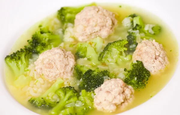 Soup with meatballs, rice and vegetables