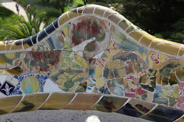 Fragmenes of Gaudi\'s mosaic work in Park Guell in Barcelona, Spain