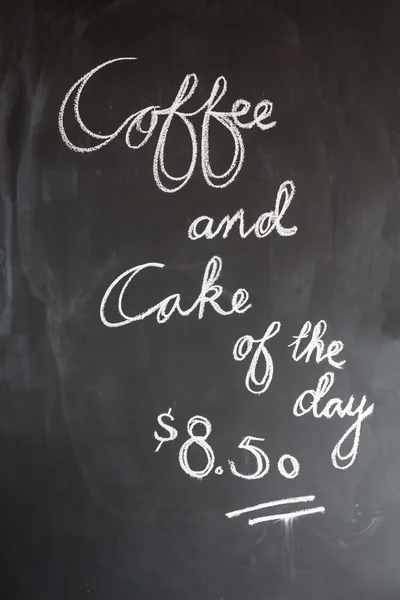 Coffee and cake sign in cafe