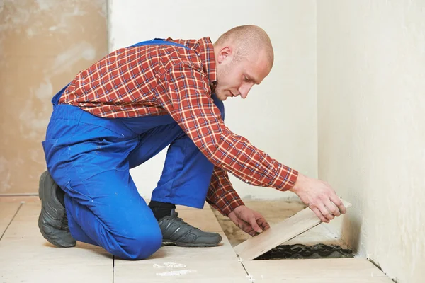 Tiler at home floor tiling renovation work