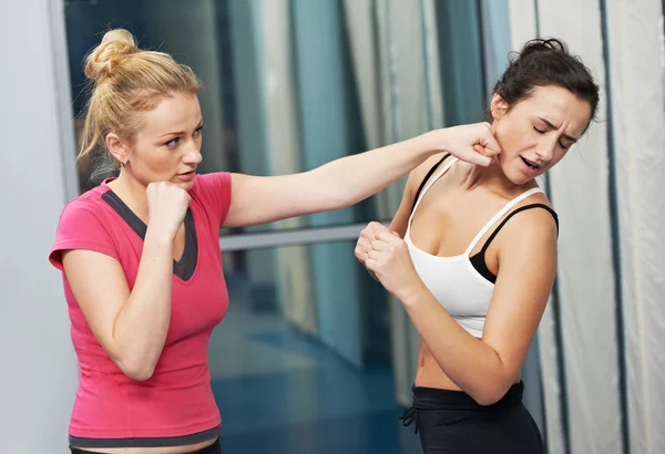 Healthy woman at fitness fighting training