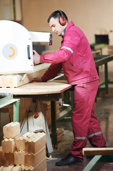 Woodworking of beam at factory
