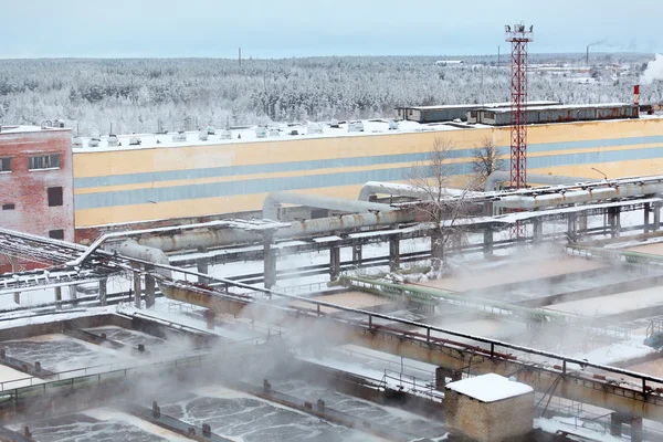 Industrial view of sewage treatment plant with evaporation in winter season