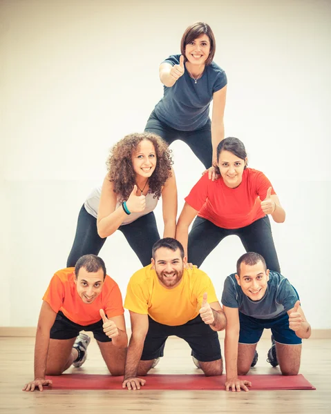 Human Pyramid and Thumbs Up