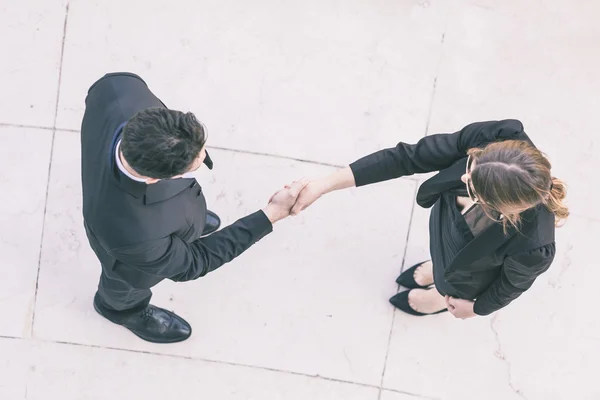 Business People Giving Handshake, Aerial View