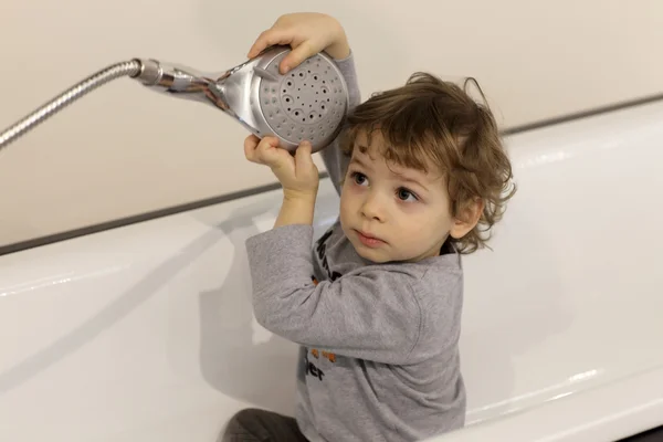 Child with watering can