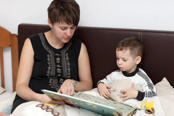 Mother reading book