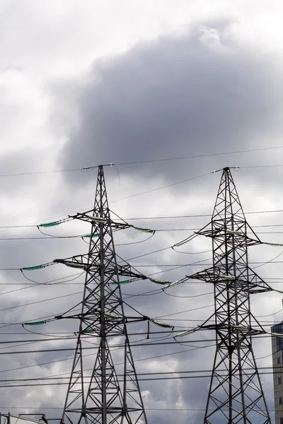 High voltage tower at sky