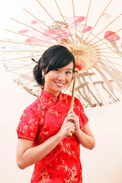 Chinese woman with umbrella