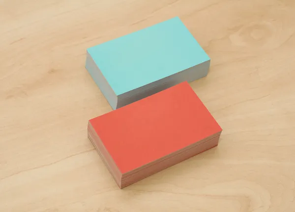 Block of business cards on a wooden table