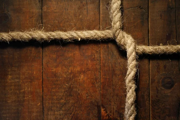 Knotted Rope On Wood