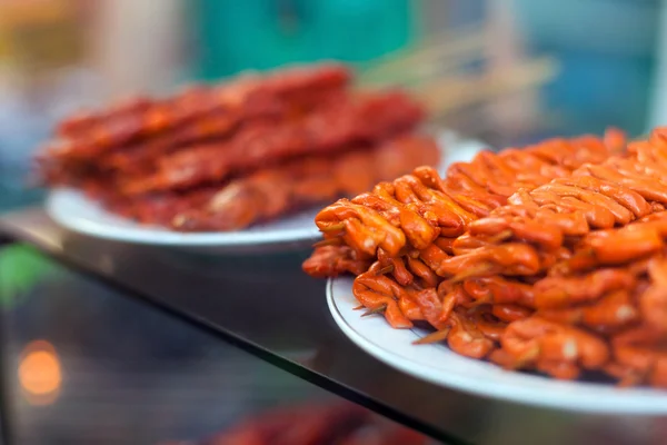 Chicken intestines, pig ears and pig intestines barbeque screw,