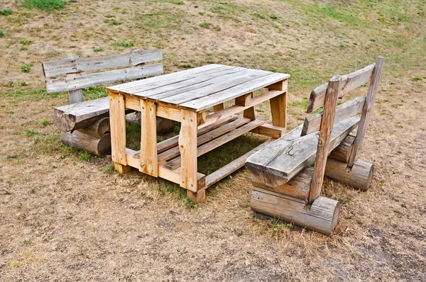 :Rough wooden bench