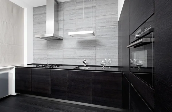 Part of modern minimalism style kitchen interior in monochrome tones
