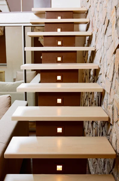 Modern style staircase and ashlar wall, interior detail