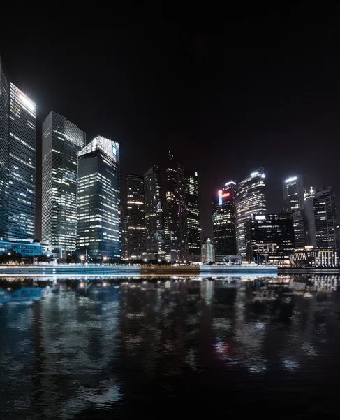 Singapore skyline night panorama.