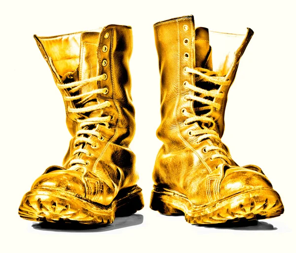 combat boots with gold hardware