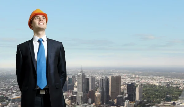 Businessman standing on the construction site