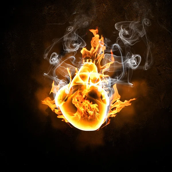 Human heart in fire flames