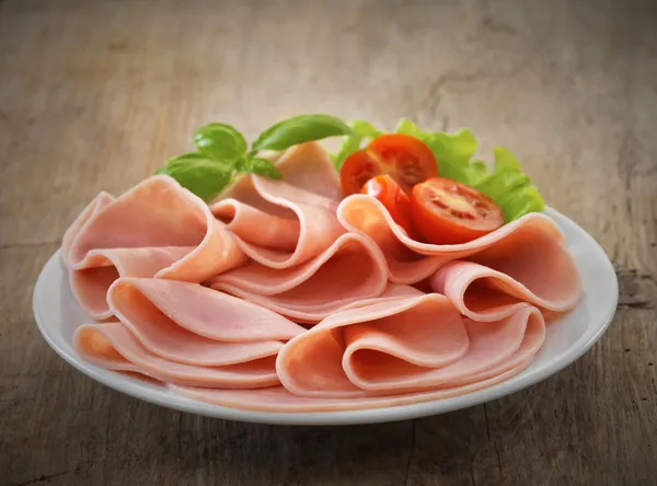 Pork ham slices on plate