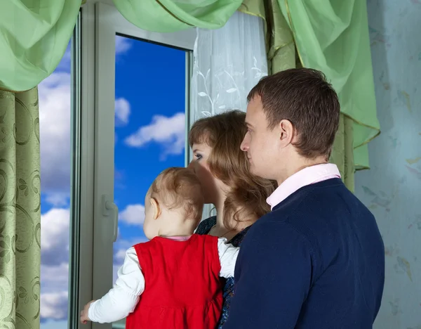 Family looking out the window