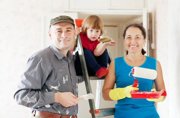Family makes makes repairs in apartment