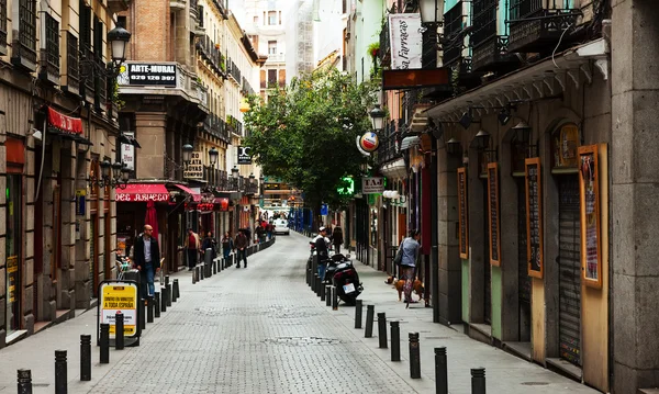 Old narrow street with few cafe in Madrid