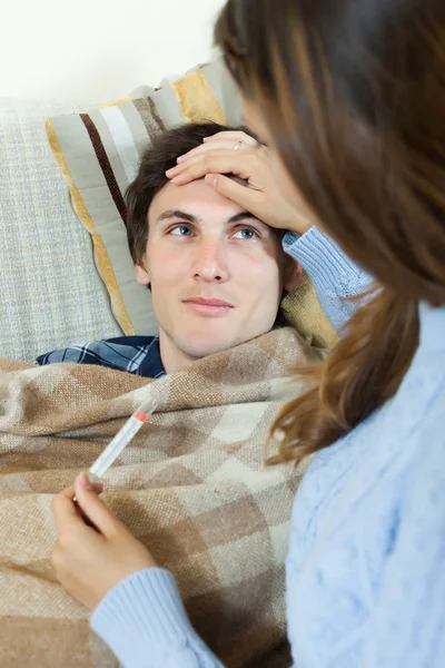 Woman caring for sick boyfriend