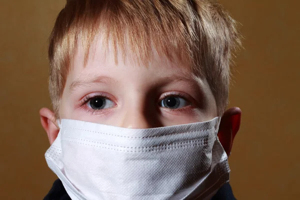 Boy in medical mask