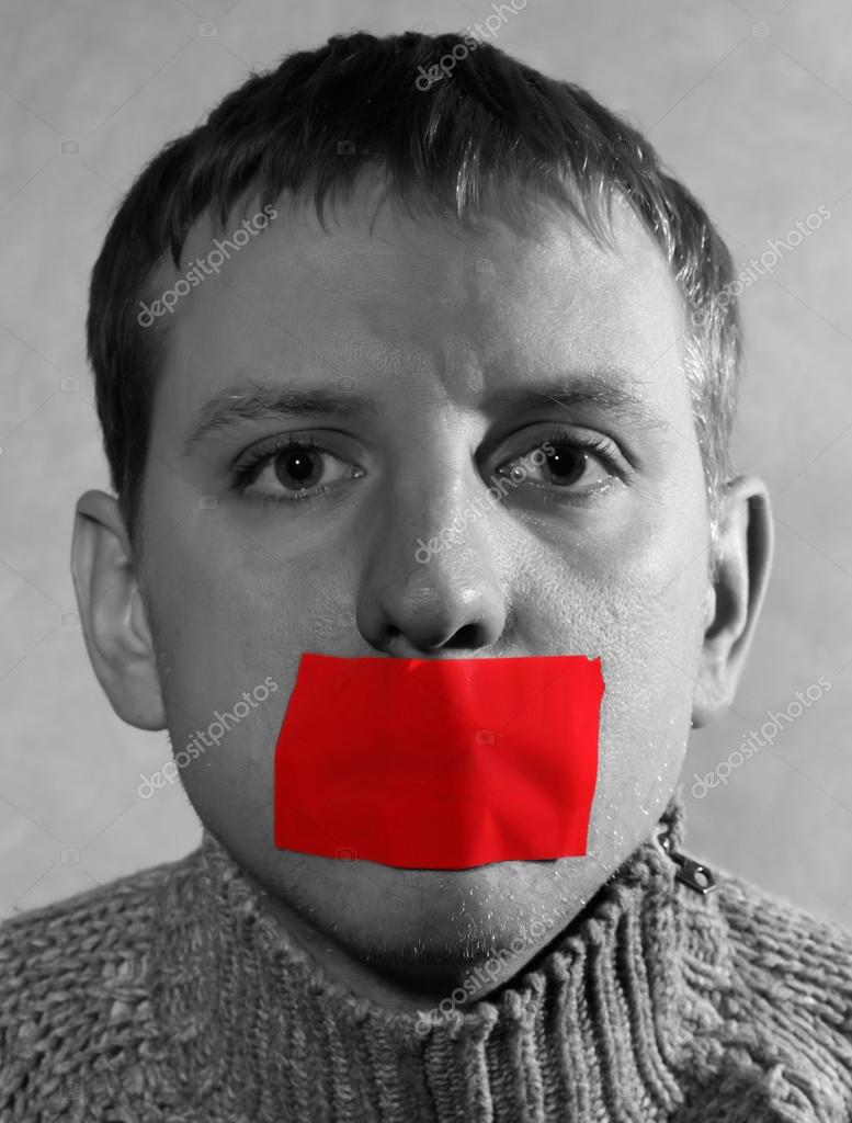 Man with closed red tape mouth — Stock Photo © 21477347