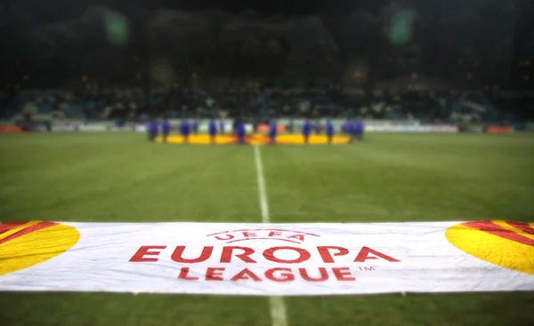 Official UEFA Europa League banner at the field