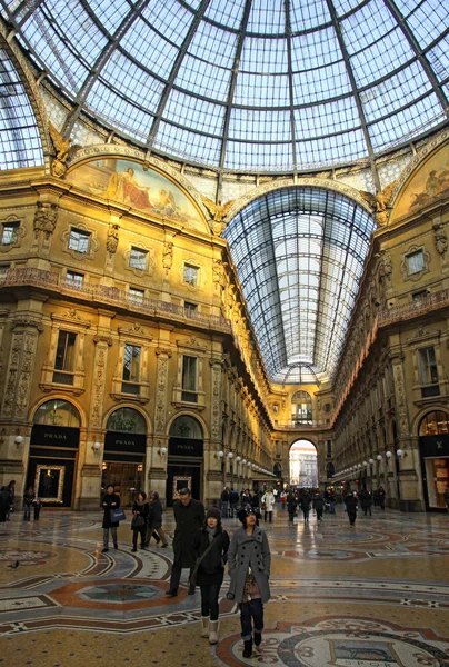 MILAN, ITALY - DECEMBER 31, 2010: People walking inside the Galleria Vittorio Emanuele - famous shopping gallery with elegant boutiques and fashion creator outlets on December 31, 2010 in Milan, Italy