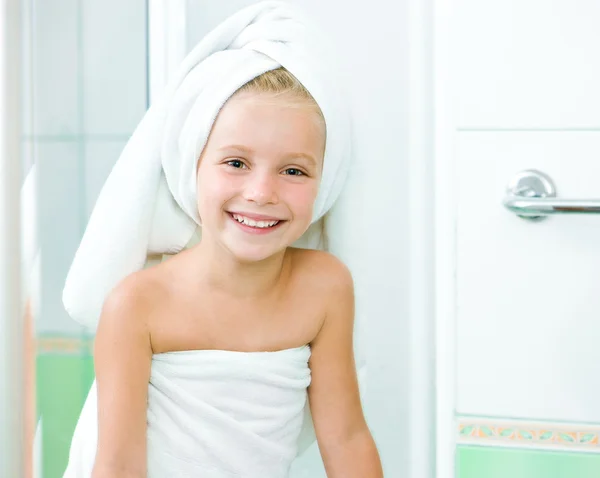 Cute little girl washing