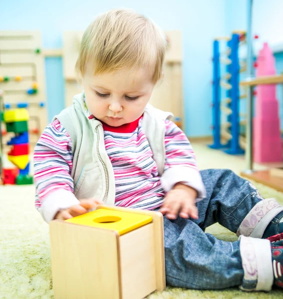 Little girl in the classroom early development