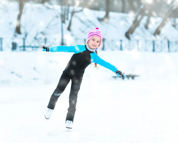 Little girl skating outdoors