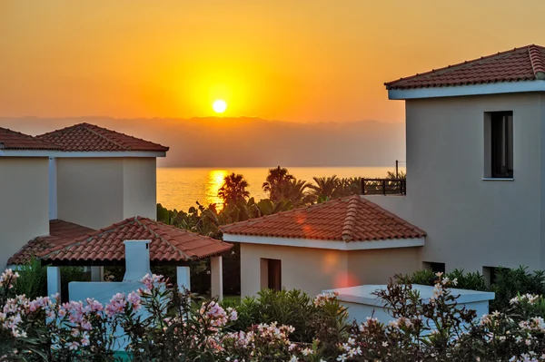 Sunset over holiday beach villas