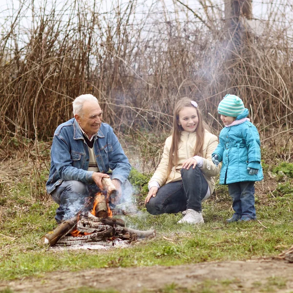 Grandfather with two grandchildren