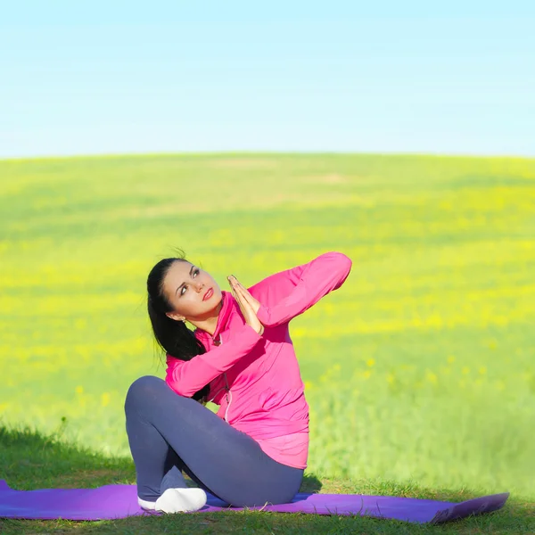 Woman practices yoga