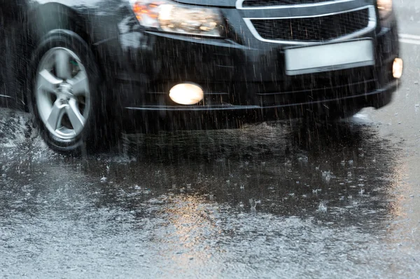 Car in a downpour