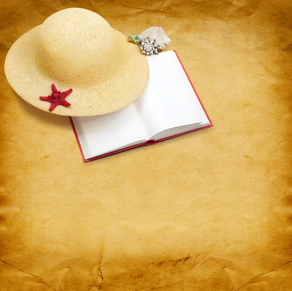 Straw hat with book