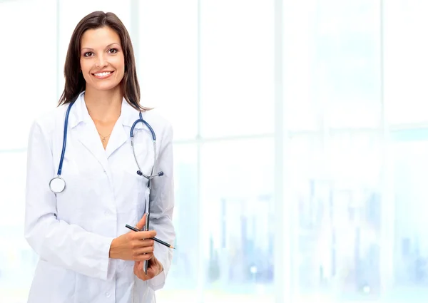 Smiling medical doctor woman with stethoscope