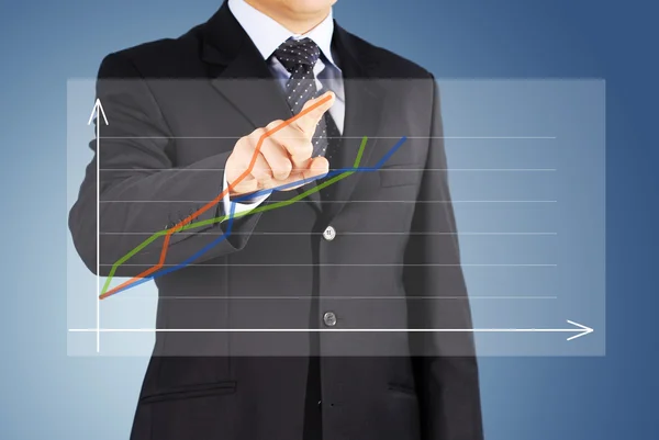 Image of male hand pointing at business graphics